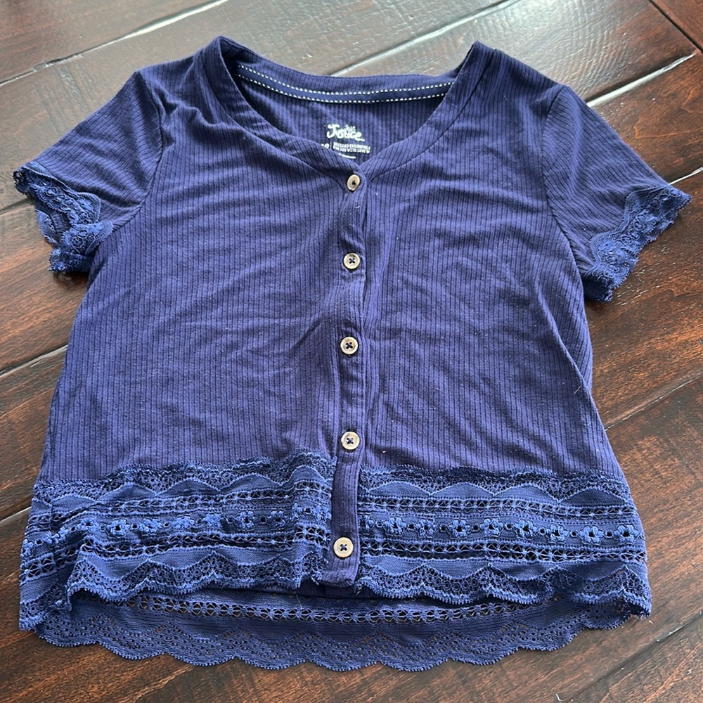 Justice girls’ dark blue tee with lace detail.